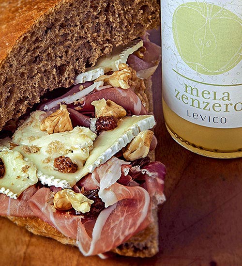Chef Reponi consiglia l'abbinamento gourmet Melazenzero Bio Levico e speck
